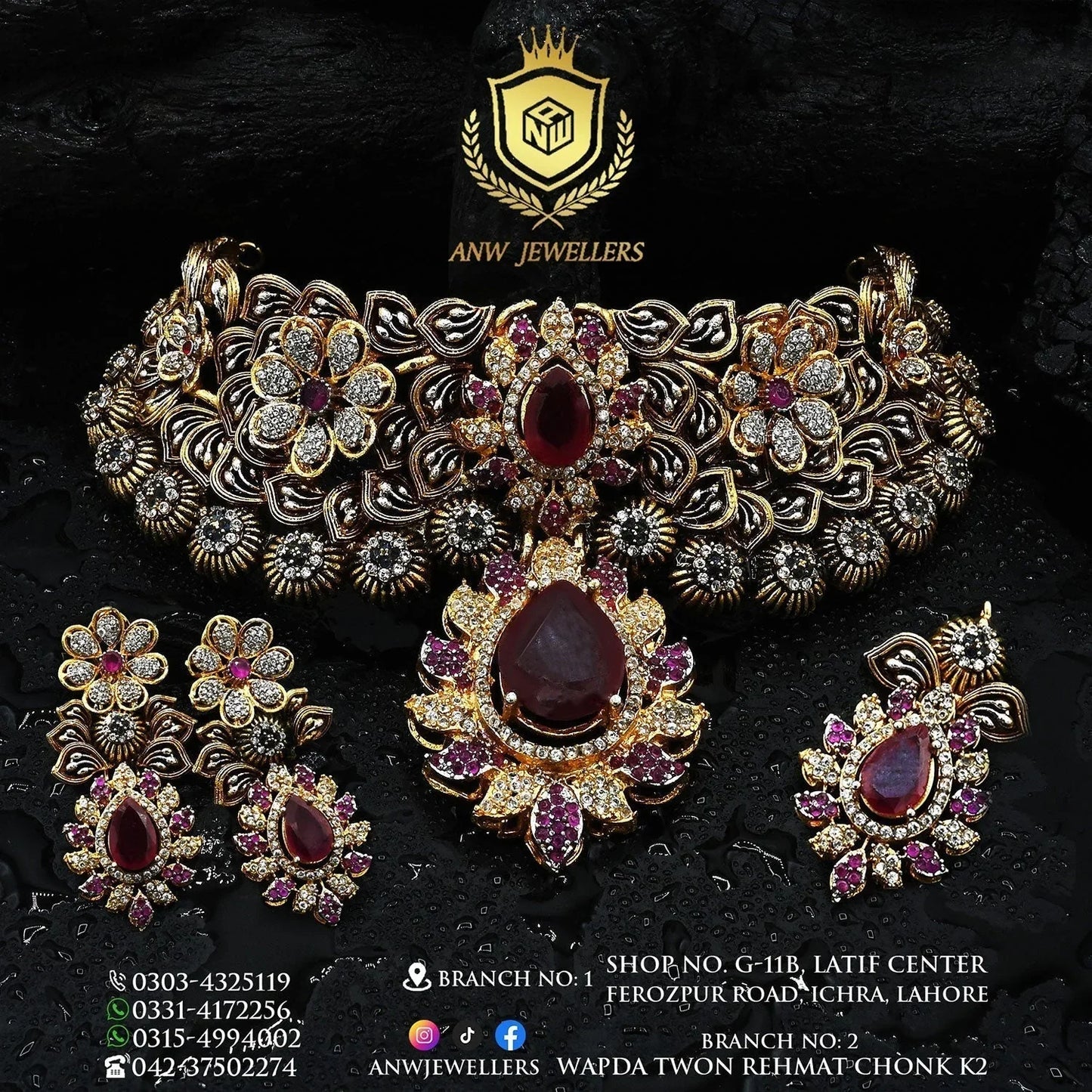 Gold bridal jewelry set with red and white stones, floral motifs by ANW Jewellers.