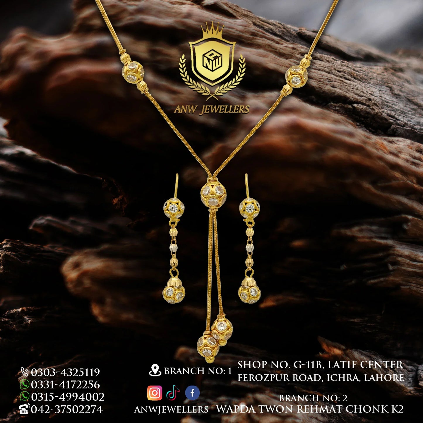 ANW Jewellers gold jewelry set with necklace and earrings on dark wood background