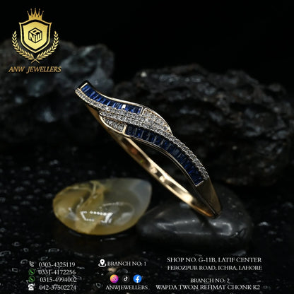 Gold Bangle with Blue Sapphire & Diamond Accents 